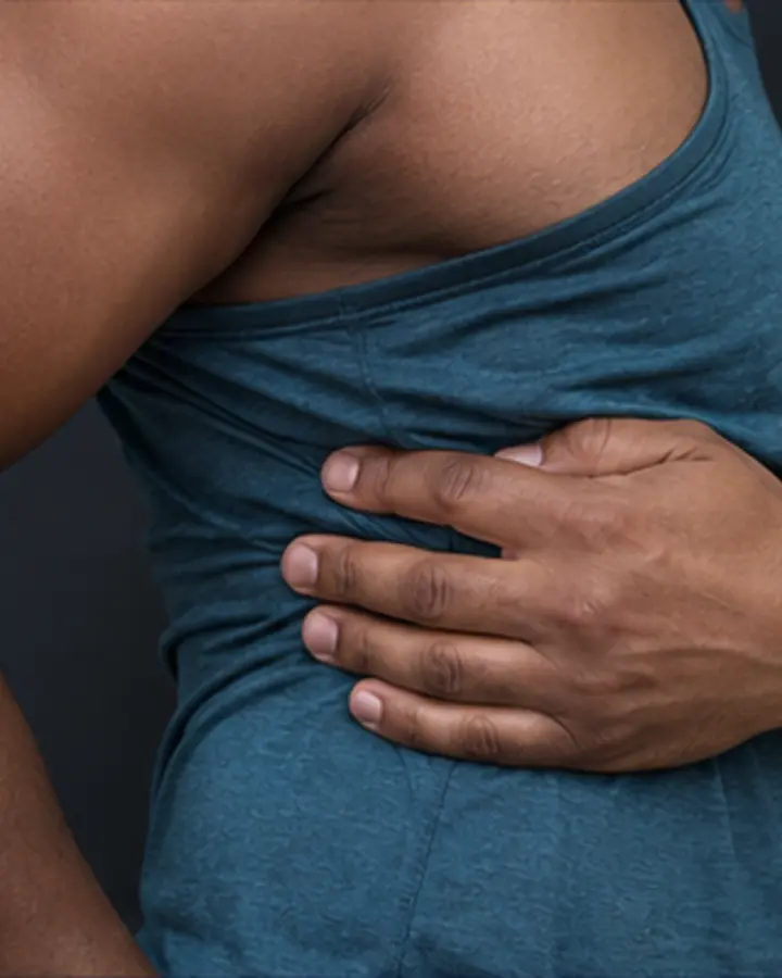 Person experiencing symptoms related to Intercostal muscle strain