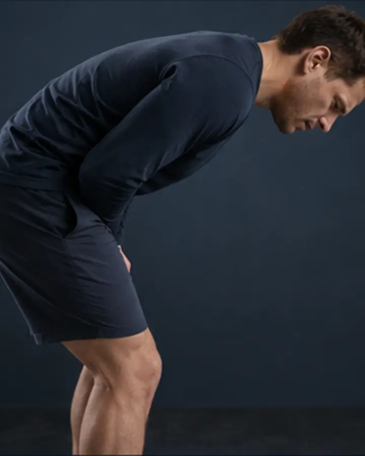 Person experiencing symptoms related to Lumbar disc-related pain