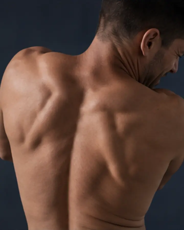 Person experiencing symptoms related to Thoracic disc-related pain