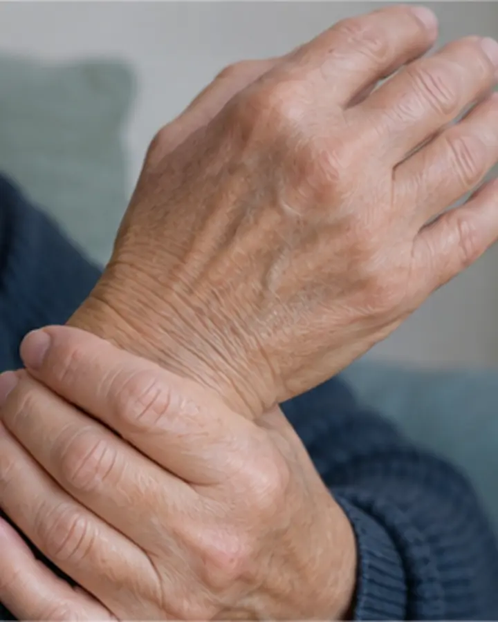 Person experiencing symptoms related to Wrist osteoarthritis